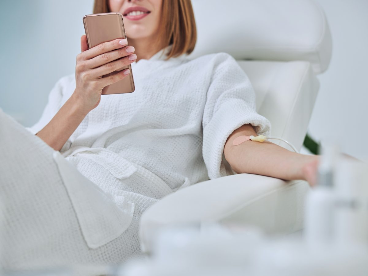 IV & Advanced Therapies — patient receiving IV therapy in a serene treatment chair